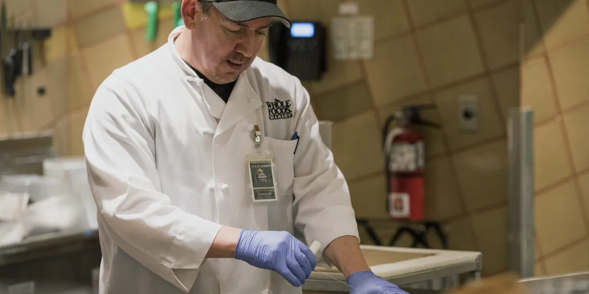 Amazon is investing $230 million in higher pay, benefits, and college perks for more than 100,000 Whole Foods workers—bumping up hourly pay to $21