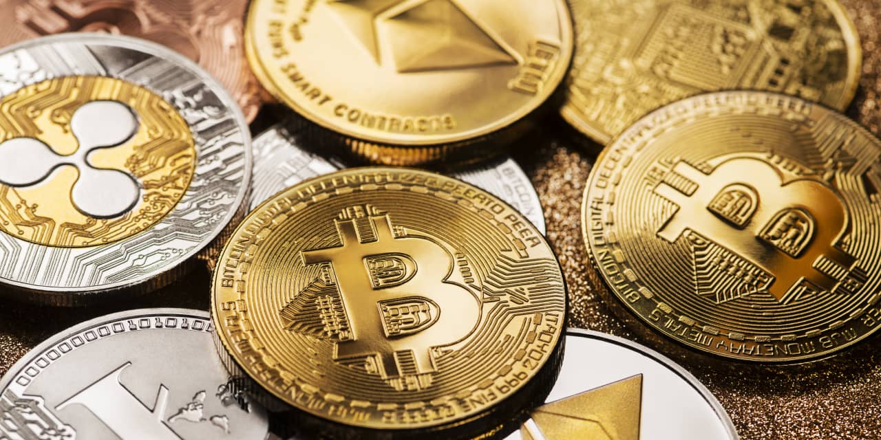 Bitcoin Holds Below $60,000 as Cryptos Slide