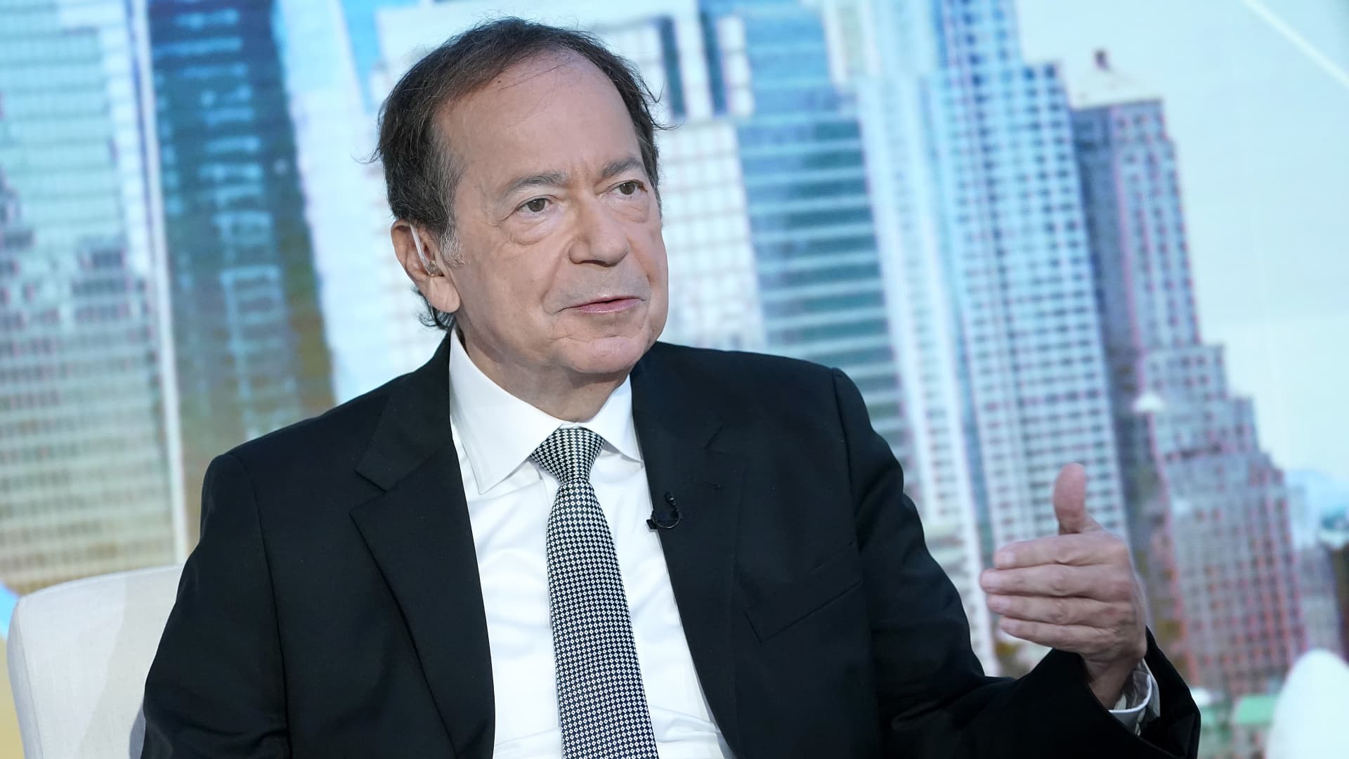 John Paulson says we are in the early stages of a long-term bull market for gold