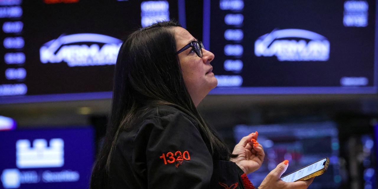 Nasdaq Slips Ahead of Earnings From Tesla, Alphabet