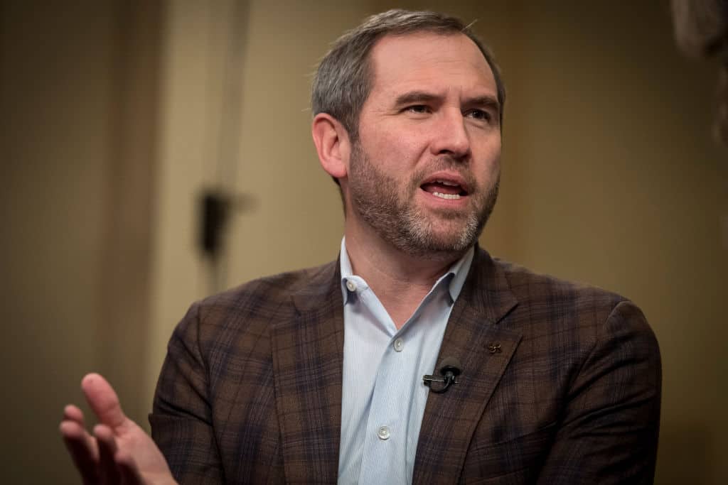 Ripple’s Garlinghouse Fires Back After Jamie Dimon Targets Coinbase and CLARITY ACT