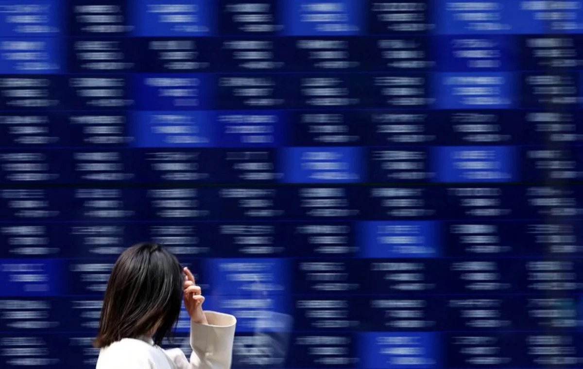 Wall Street ticks up as tech hopes offset Middle East worries